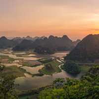 Puzhehei's Tranquil Waters & Lotus Blooms