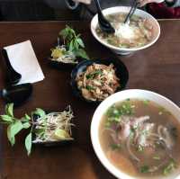 Hot pho (Vietnamese noodles soup) in a cold snowy day