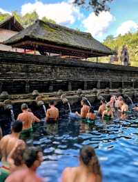A Purification Rituals at Tirta Empul, absolutely a spiritually enlightening experience!