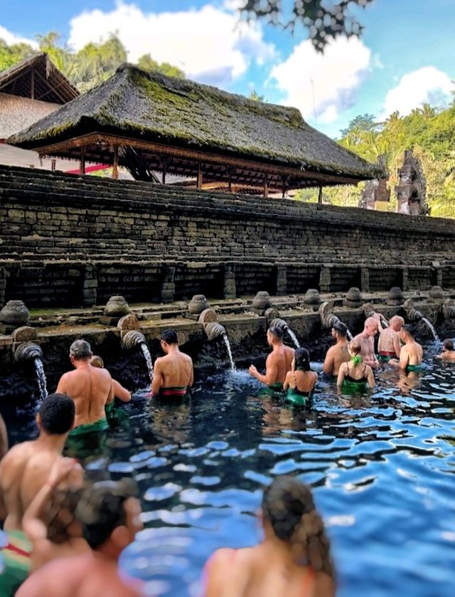 A Purification Rituals at Tirta Empul, absolutely a spiritually enlightening experience!