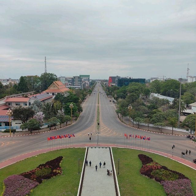 Ascending to Elegance: Patuxay's Embrace Above Vientiane