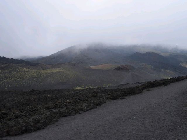 Exploring the foggy Mount Etna 