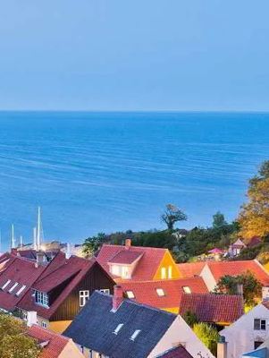 Gudhjem — The Danish Island Town Where Smoked Herring Perfumes the Air and the Baltic Stretches to 