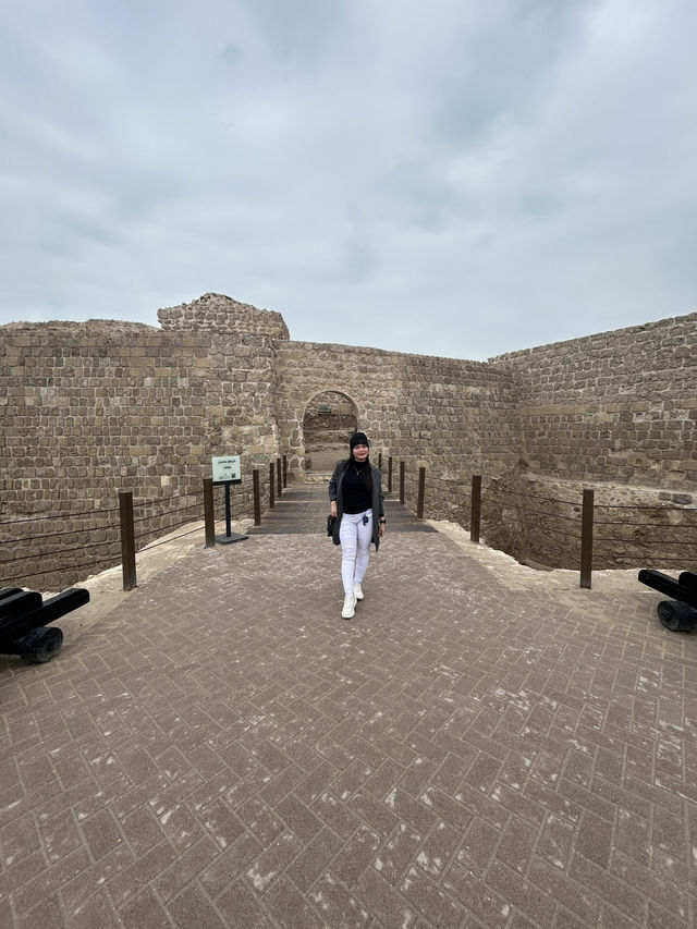 “Whispers of the Past: The Timeless Walls of Bahrain Fort”