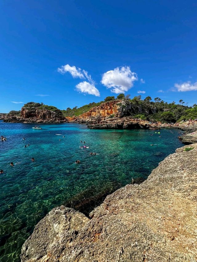 Turquoise Dreams and Sandy Toes at Cala Llombards