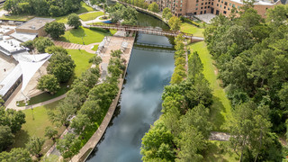 Waterway Square, Bridges, Shaded Paths, and Evening Reflections