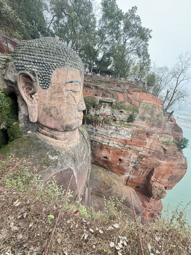 Awe-inspiring Buddha statue. The Leshan Giant Buddha is a 71-metre tall stone statue