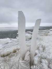 新疆阿勒泰烏倫古湖｜在銀白色冬天趕一場雪海日落