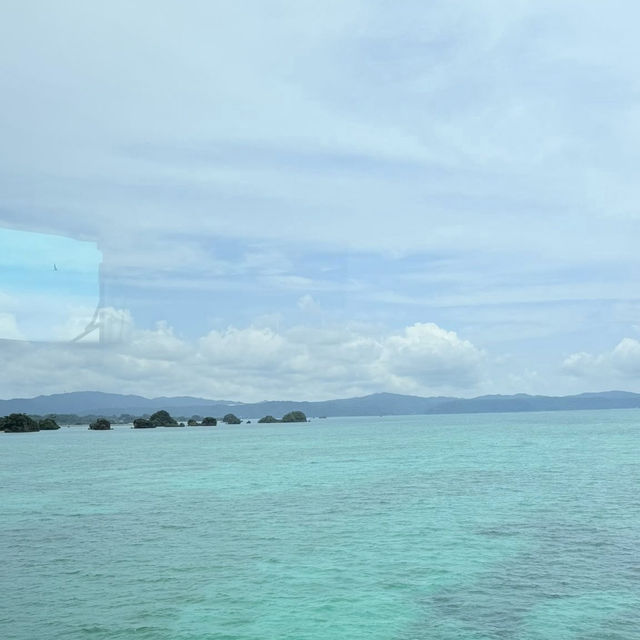 Kouri Island: Okinawa’s Tiny Paradise – A Solo Traveler’s Day Trip Dream"** 🌊🌴 