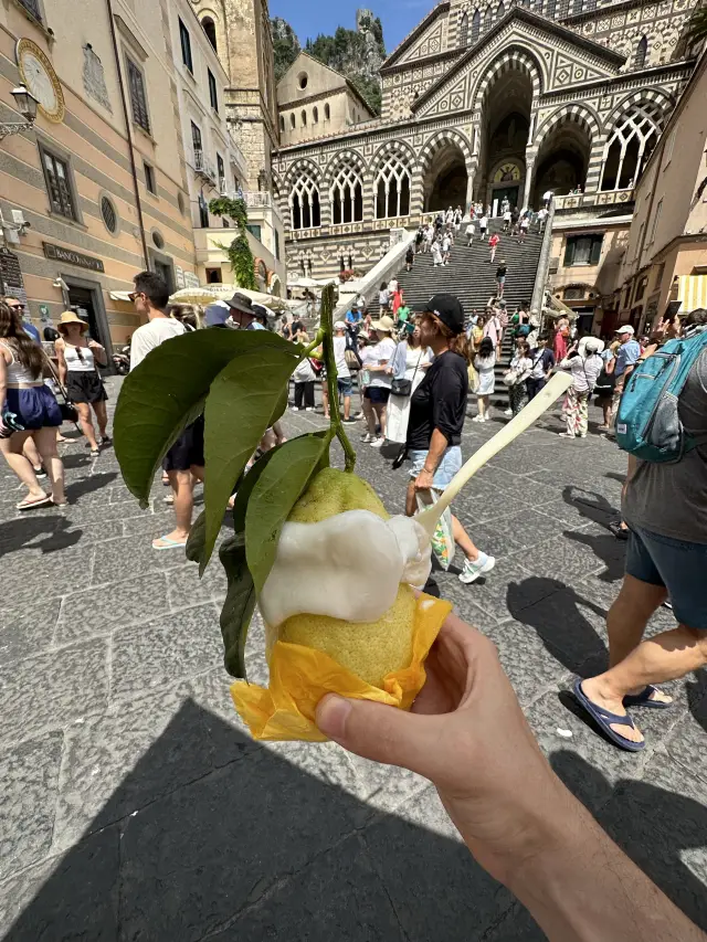 Enjoying lemon sorbetto in Amalfi Coast 🍋