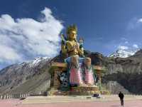 Buddha overlooking mountains 