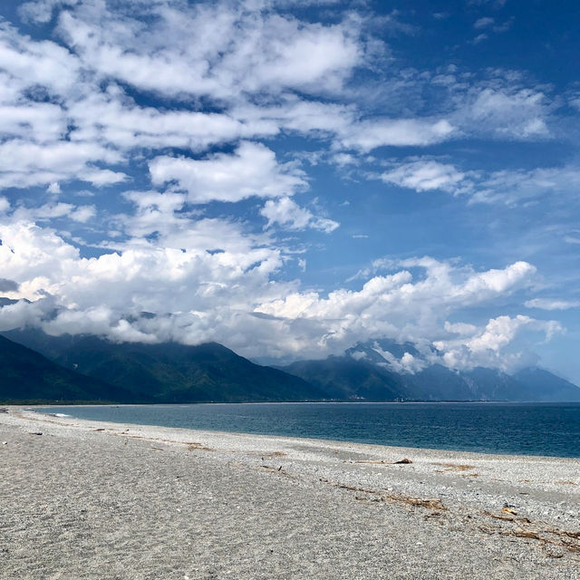 Escape to the pristine shores of Qixingtan Beach, where the mountains kiss the ocean