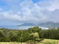 Cliffs, clouds, and colors: a rainbow at Tasman National Park Lookout