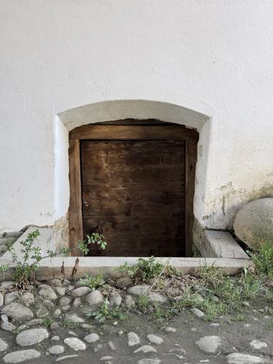 Step Into Storybook Charm at Viscri! 🚪🪟🏡  
If you love quaint villages, Viscri is an absolute treasure—cobblestone lanes, pastel houses, and the legendary Viscri door and window collection that’ll have your camera working overtime! Plus, don’t miss King Charles's House, now a lovely guesthouse with traditional Transylvanian flair.

🗺️ Route & Must-Dos:  
Start your stroll from the legendary blue house (easily spotted) and wander up the village’s main Unnamed Road. Keep your eyes peeled for the most eclectic collection of old Saxon doors and windows—you’ll find everything from sun-faded woodwork to vividly painted shutters. Don’t be shy about slowing down; walk, look closely, and snap away!

📸 Top Photo Spots:  
· The blue house with its gorgeous wooden doors (that iconic Viscri photo!)
· Rows of mismatched, pastel windows—try shooting at golden hour for that dreamy glow
· King Charles’s House (often with bikes or old wagons out front for perfect framing)

🏠 King Charles's House:  
Peek inside if possible. The restoration here preserves so much history—great for photos and a taste of genuine village atmosphere.

🔎 Tips:  
· Arrive early morning or late afternoon for the softest light and fewer day-trippers.  
· Some locals might invite you to peek at their hidden gardens or artisanal workshops—say yes if you get the chance!  
· The main road is uneven, so wear comfy shoes.  

⚠️ Precaution:  
Watch out for village dogs and always ask permission for close-up photos of private homes.

#Viscri  #Transylvania  #HiddenGems  #CulturalHeritage  #TravelRomania 