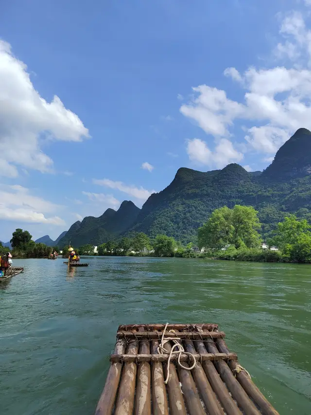 Bamboo rafts drift along, bringing a bubbly joy to the heart