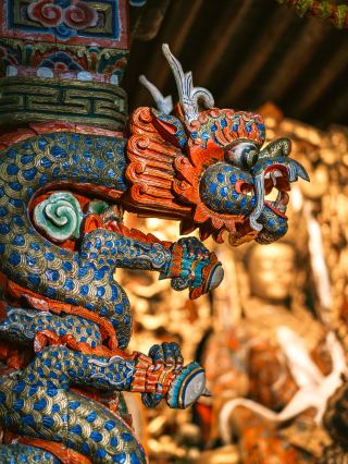 Visit the garden of the gods and be amazed by the beauty of Muli Grand Temple