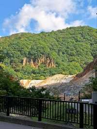 “Journey Through Steam: The Hiking Path to Hell Valley’s Onsen”