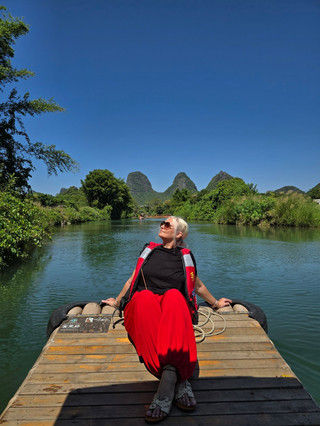 We've visited a magical place. It's Yangshuo.
The karst mountains are mesmerizing. The midday sun illuminates the rice fields and bathes the mountain peaks in its light. The fresh evening air invigorates and lifts your spirits.
Living photo wallpapers are everywhere you turn. The place is filled with relaxation and soul.
This beauty makes you want to wander all day long. Ride, fish, or maybe just enjoy nature.
I recommend renting an electric bike/motorbike/tuktuk and exploring every nook and cranny of the 10-mile route. Stop at cafes between rides and admire the rice fields and mountain peaks while sipping your favorite drinks.
Leisurely, with pleasure. That's the only way I can describe this wonderful and enchanting place.
I'll definitely be back to Yangshuo. It's love.