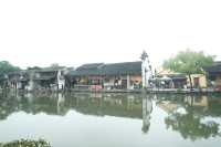 煙雨洗青簷，初夏邂南潯