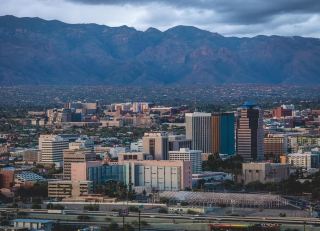 I’ve just got back to Bristol and honestly, my flat feels extra grey today after spending a couple of days in the absolute sun-drenched dream that is Tucson. I usually stick to quieter European spots for my yearly getaways, but I had to head over to the US recently and decided to tag on a quick weekend in Arizona. And oh my word, it was brilliant!

Tucson is completely surrounded by these dramatic mountains and the Sonoran desert. First things first: the cacti. I knew they’d be big, but the Saguaros in the Saguaro National Park are absolutely towering – they look like giant green statues frozen in the sand. I went to the Desert Museum first (which is actually more of a massive outdoor nature reserve with wolves and hummingbirds) and then popped into the National Park West. My biggest advice? Do this as early as humanly possible. I’m an analyst by trade, so I do love a spreadsheet and a schedule, but even I underestimated how intense that desert sun gets by midday. Drink water, then drink some more!

Now, for my absolute favourite bit, which is slightly nerdy but incredibly cool: the Titan Missile Museum. It’s an actual underground Cold War missile silo. Standing right next to a deactivated nuclear missile is quite surreal, to be honest. It appeals to my analytical brain, but it’s honestly fascinating for anyone. You absolutely have to book the underground tour in advance though, as slots are quite tight.

On the complete opposite end of the spectrum, the San Xavier del Bac Mission is stunning. They call it the 'White Dove of the Desert' and it really does just gleam white against the dusty brown landscape. Inside is full of beautiful, historic Spanish colonial art.

Oh, and the food! I didn't actually know this before booking, but Tucson is a UNESCO city of gastronomy. I had some incredible Mexican food near the historic block and did a bit of vintage shopping around the 4th Avenue district. 

Just a quick heads-up on getting around: I relied on Ubers, which was absolutely fine in the city centre, but out by the missile museum or the national park, you might have to wait a fair bit for a car to find you. So, pack some patience and maybe order your ride 15 minutes before you actually want to leave.

All in all, a proper little adventure. Now, back to my spreadsheets and the British rain...