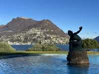 Stroll along the promenade of Lake Lugano in Switzerland