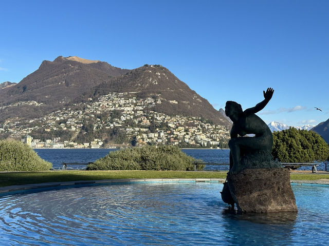 Stroll along the promenade of Lake Lugano in Switzerland