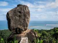stunning beaches, crystal-clear waters, and lush palm-covered hills