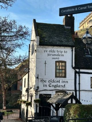 Built into the sandstone cliffs below Nottingham Castle, parts of the pub are carved directly into the rock, creating a unique and atmospheric interior