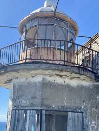 A beautiful lighthouse on a cliff