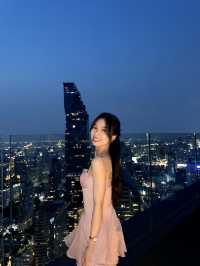 Pink dress with Mahanakhon sunset