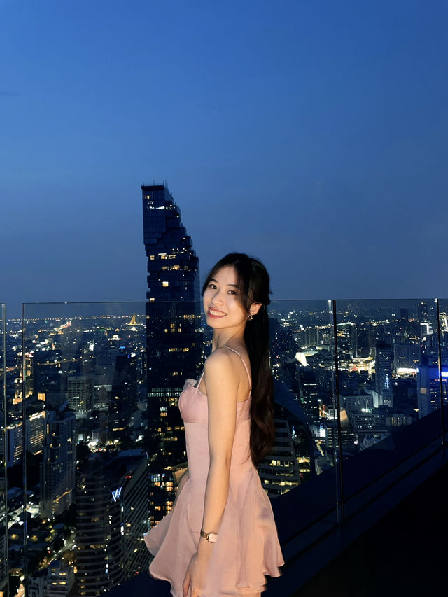 Pink dress with Mahanakhon sunset