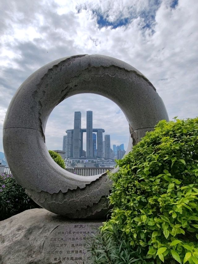 Doughnut Frames the Skyline: A Sweet Urban Snapshot