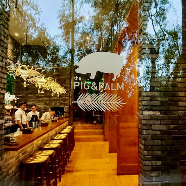 The Pig and Palm