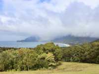 Cliffs, clouds, and colors: a rainbow at Tasman National Park Lookout