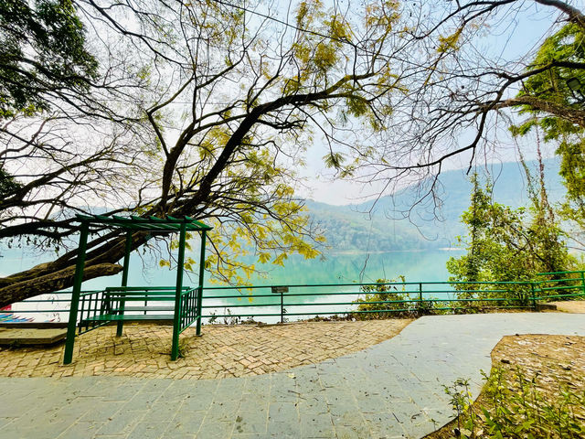 The serene shores of Phewa Lake.