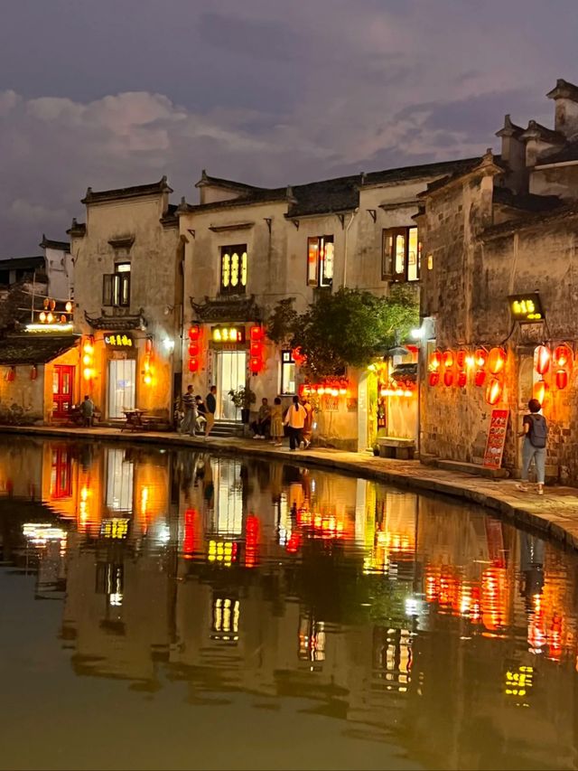 Crescent Reflections: A Journey Through Hongcun’s Timeless Mirror