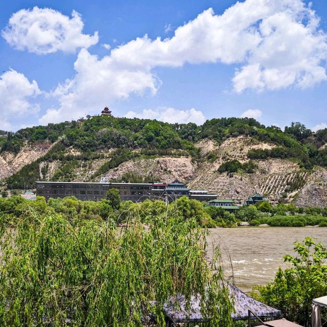 On two wheels, embracing the sights and sounds of the historic Yellow River.