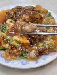 Oyster Egg Omelette on Conveyor Belt: Michelin Dish at Ningxia Night Market