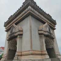 Ascending to Elegance: Patuxay's Embrace Above Vientiane