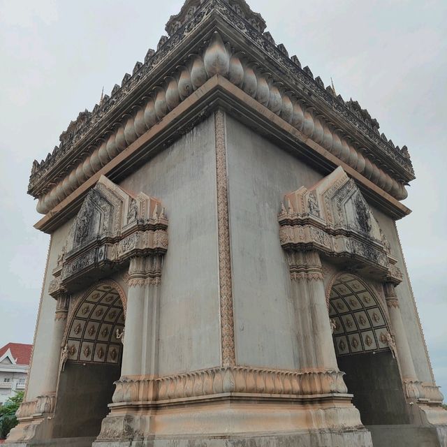 Ascending to Elegance: Patuxay's Embrace Above Vientiane