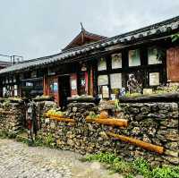 Quaint stone village under Yulong Mountains