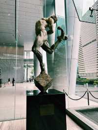 Sculpted Stories at OUE Bayfront: A Lobby of Contemplation and Courage