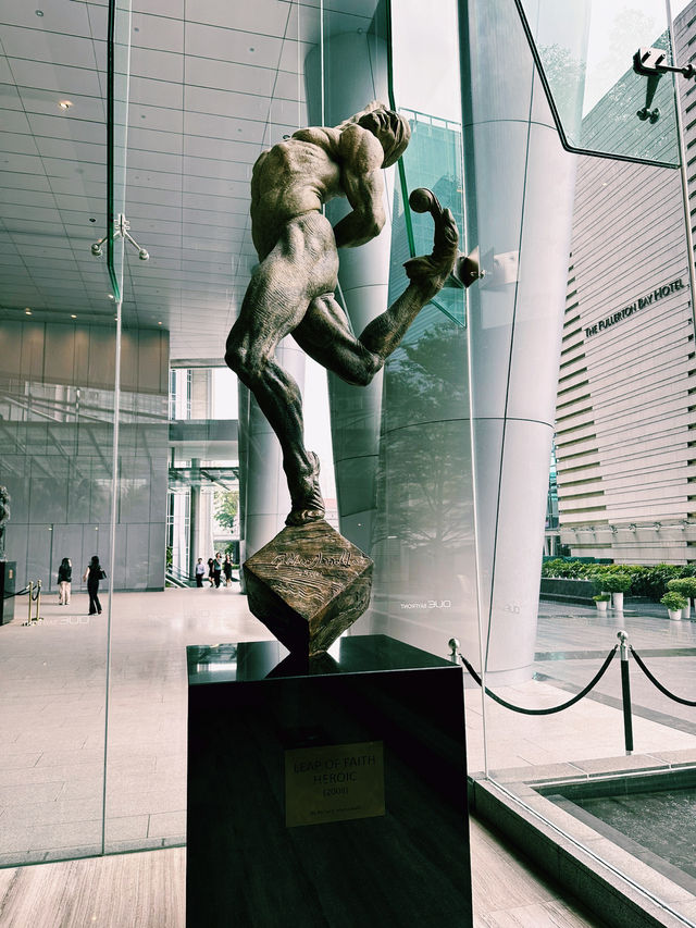 Sculpted Stories at OUE Bayfront: A Lobby of Contemplation and Courage