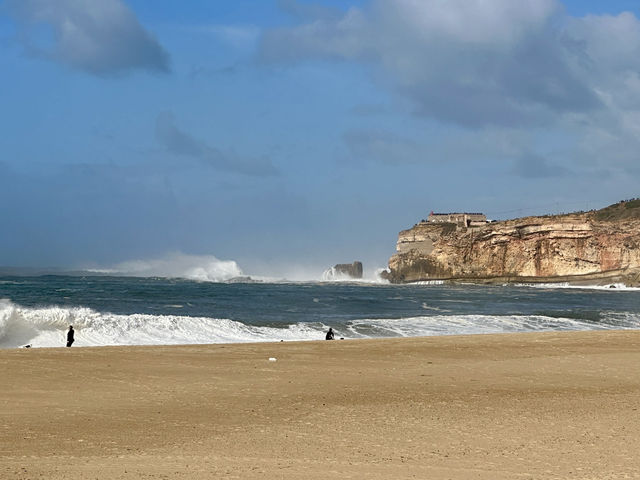 🌊 Nazaré Beach, Portugal: Where Giants Rise from the Sea 🏄‍♂️🇵🇹