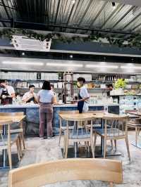 “Mori Kohi KL: A Tranquil Hideaway of Minimalist Charm and Lush Greenery”