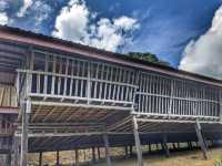 “Echoes of Tradition: Embrace the Longhouse Legacy at Sabah Tea Resort”