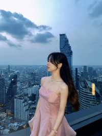 Pink dress with Mahanakhon sunset