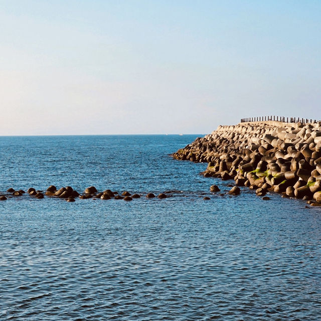 A Scenic Promenade with Ocean Views and Public Art