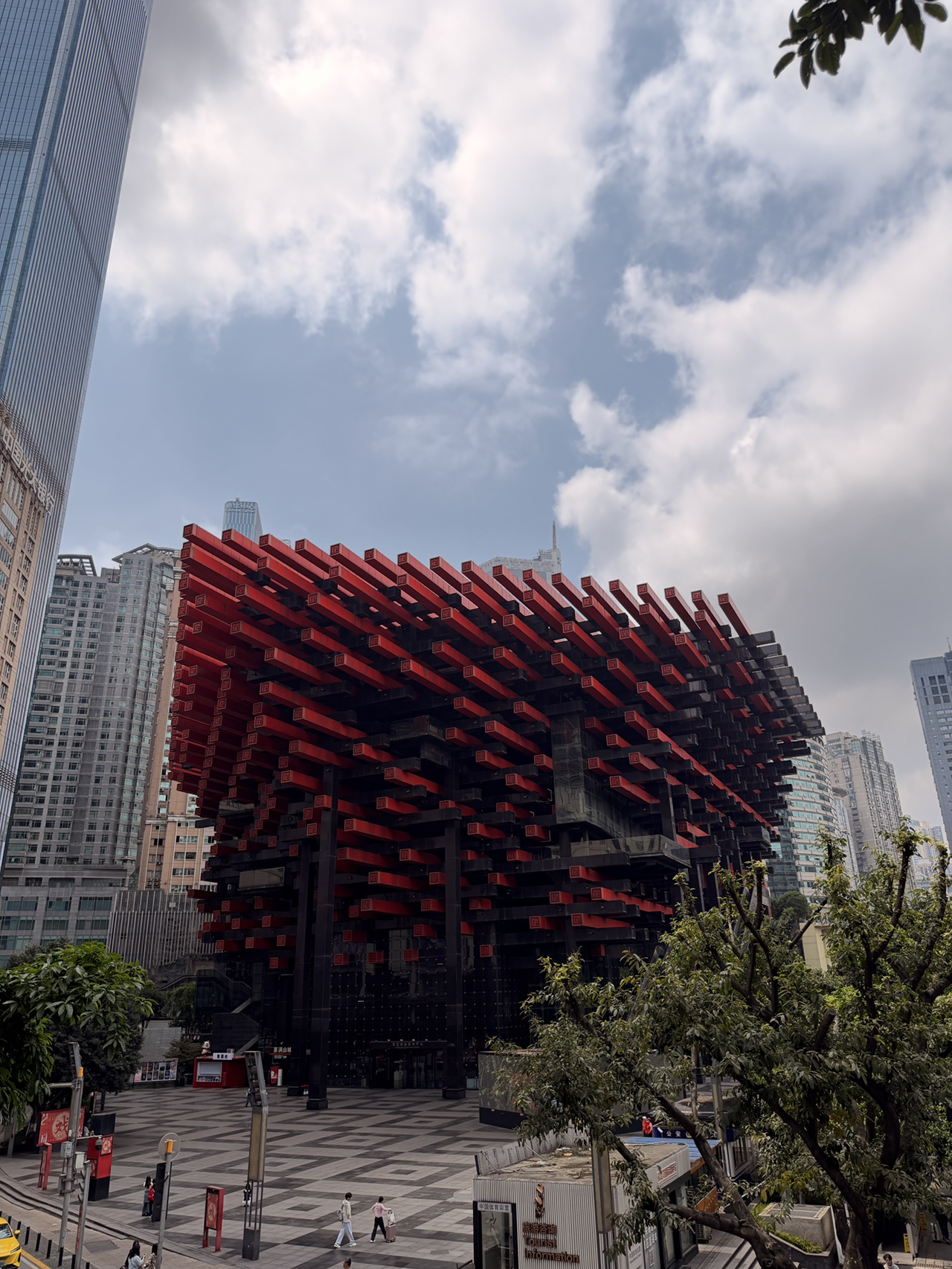 
Chongqing is one of China's most unique megacities. Here, trains pass straight through apartment buildings, streets are stacked on multiple levels, and skyscrapers tower right over the river.

If you only have 1 day, here’s an itinerary to experience the real Chongqing 👇

1️⃣ A subway station inside a building 🚇
📍 Liziba Station
The city's most iconic landmark. The monorail runs directly through a residential building.
The best time to visit is in the morning when there are fewer crowds.

2️⃣ A park with a city view 🌿
📍 Eling Park
One of the best panoramic views of Chongqing.
In the spring, it's blooming with:
🌸 peach blossoms 🌸 magnolias 🌸 camellias

3️⃣ Old China
📍 Ciqikou Ancient Town
Historic streets, traditional teahouses, and classic architecture.
A great spot to try:
🍜 noodles 🥟 Chinese snacks 🍡 street food

4️⃣ The most cinematic spot in the city 🌆
📍 Hongya Cave
An 11-story building complex built into a cliff, beautifully lit up at night.
Many say this place looks just like the town from the anime "Spirited Away".

5️⃣ The best night view of Chongqing 🌃
📍 Qiansimen Bridge
This spot offers the perfect panorama of:
✨ Hongya Cave 🌉 the bridges 🌃 the skyscrapers
This is where the city looks its most futuristic.

6️⃣ Step out onto the observation deck
📍 Raffles City Chongqing Skywalk
A high-altitude glass-bottom skywalk overlooking the confluence of two rivers.
The best time to go is after 7:00 PM when the city lights come on.

💡 Fun Fact
Chongqing is known as an 8D city.
Because:
🚇 the subway runs through buildings 🏙 streets are layered on different levels 🌉 bridges connect skyscrapers 🚶 sometimes the ground-floor entrance of a building is actually... on the 20th floor.
That’s why it's so easy to feel like you've stepped into a futuristic city here.

 china     
 china   