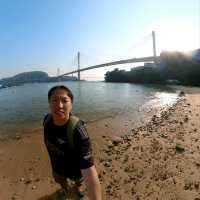黃昏日落下的汀九橋